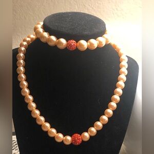 Elegant Peach/Gold Orange Pearl Necklace and Bracelet Set